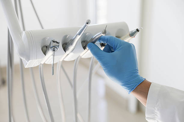 Professional Dental Implants technician working in Manistee, MI